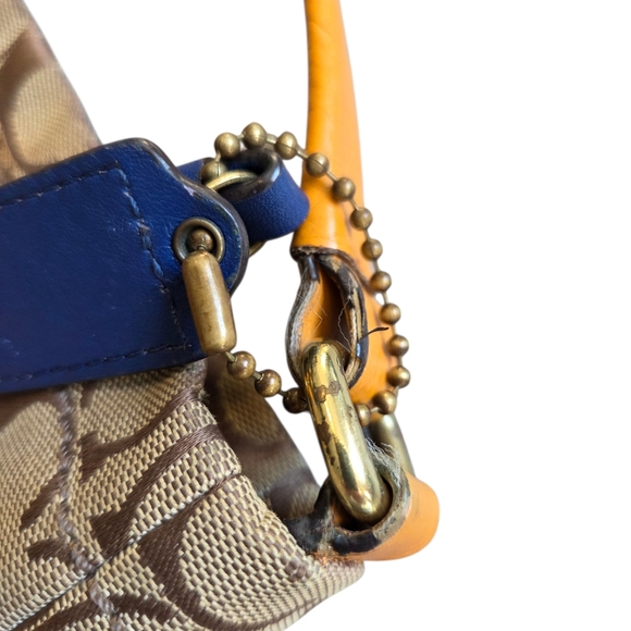 Coach Park Signature Hobo Shoulder Bag model number F23279. 